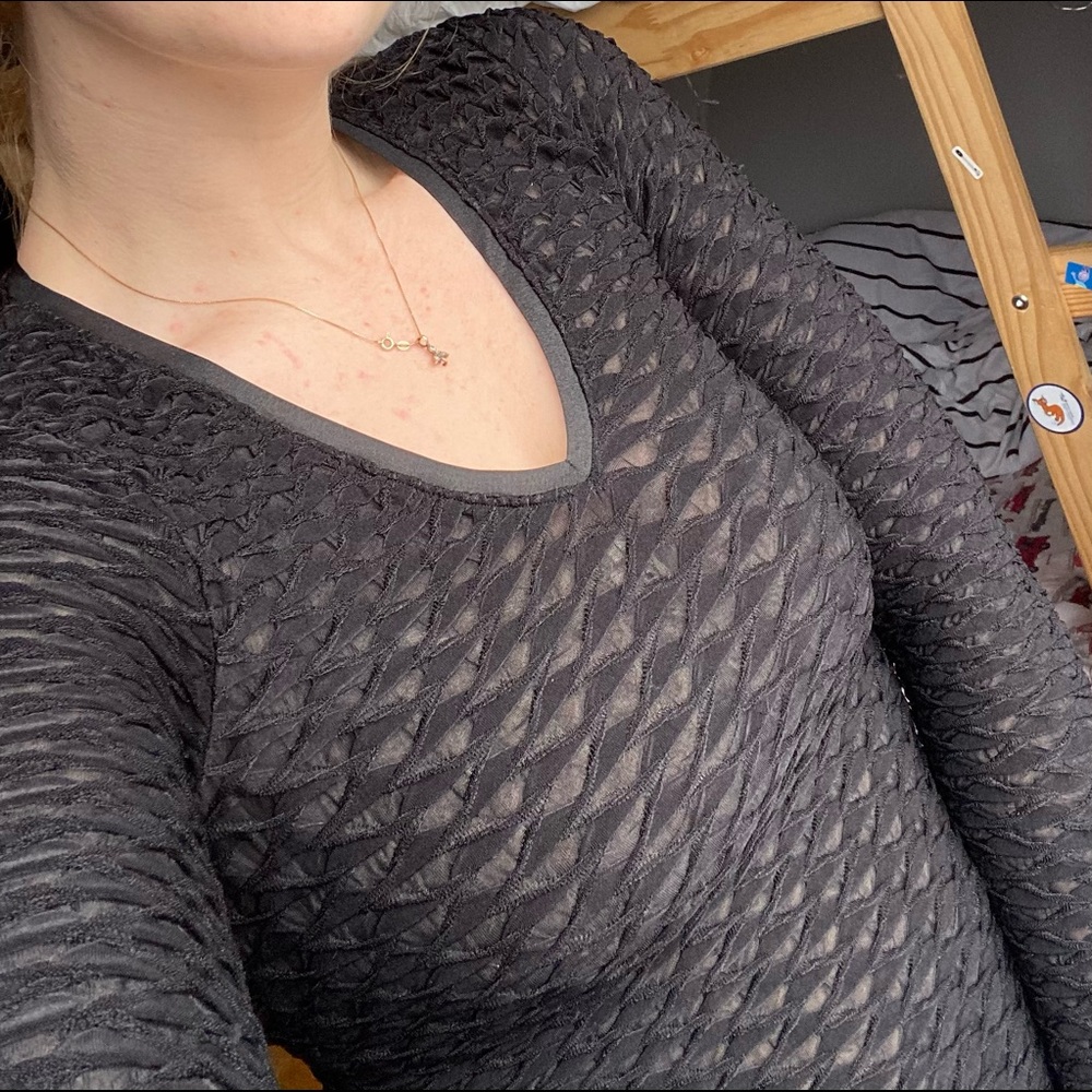 Sheer black top great under a blazer or on its own